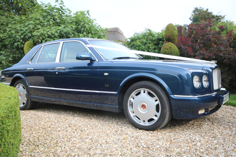 Wedding Car Hire, Dorset, Bentley Arnage wedding car, Windsor Blue Bentley, luxury wedding car Dorset, chauffeur-driven Bentley hire, elegant bridal car, Wedding Cars Dorset, wedding car Dorset, wedding car Somerset, wedding car Hampshire, wedding car Wiltshire, modern classic wedding car, Bentley wedding vehicle hire, premium wedding transport UK
