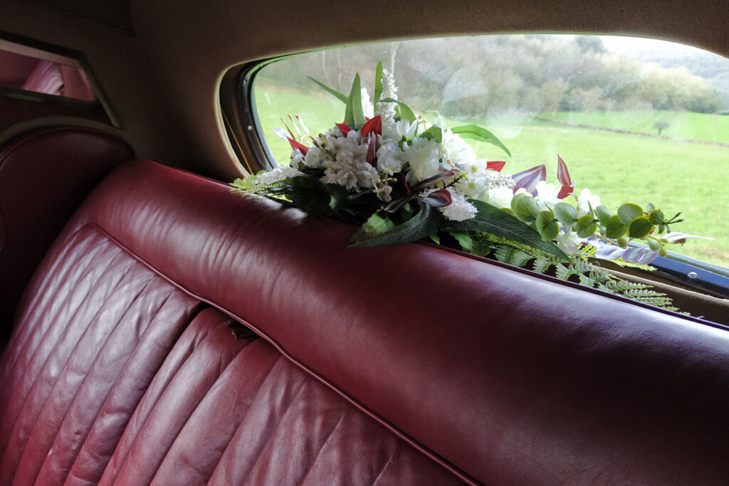 Wedding Car Hire Dorset, 1954 Rolls Royce Silver Dawn, Poppy wedding car Dorset, classic wedding car Dorset, vintage Rolls Royce hire, chauffeur-driven wedding car, red leather wedding car interior, timeless wedding transport, Rolls Royce Shillingstone, elegant bridal car Dorset, heritage wedding vehicle